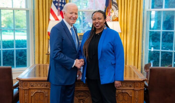 File image of Polly Irungu and outgoing President Joe Biden